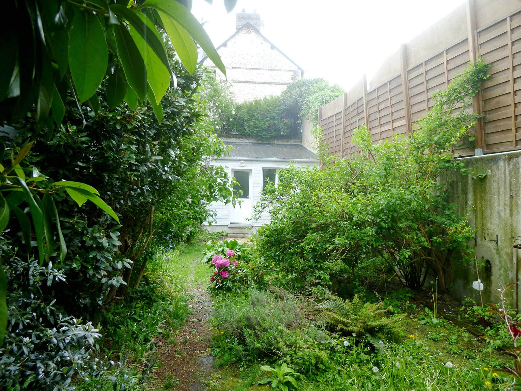 Agrandissement en ossature bois au fond du jardin